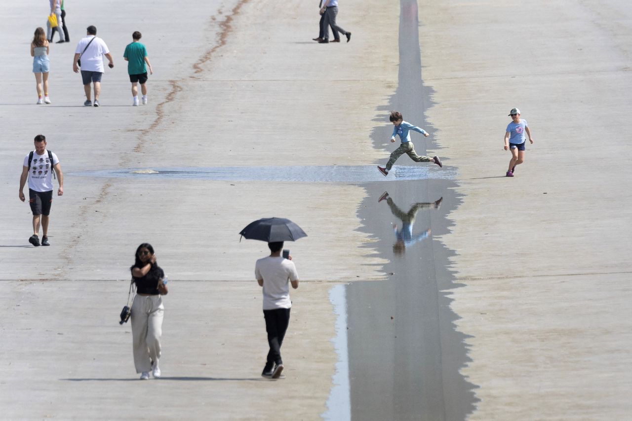 A child runs in the drained Reflecting Pool near the Lincoln Memorial in Washington, DC, on Wednesday, April 5. The pool is drained and scrubbed around this time each year. See last week in 33 photos.