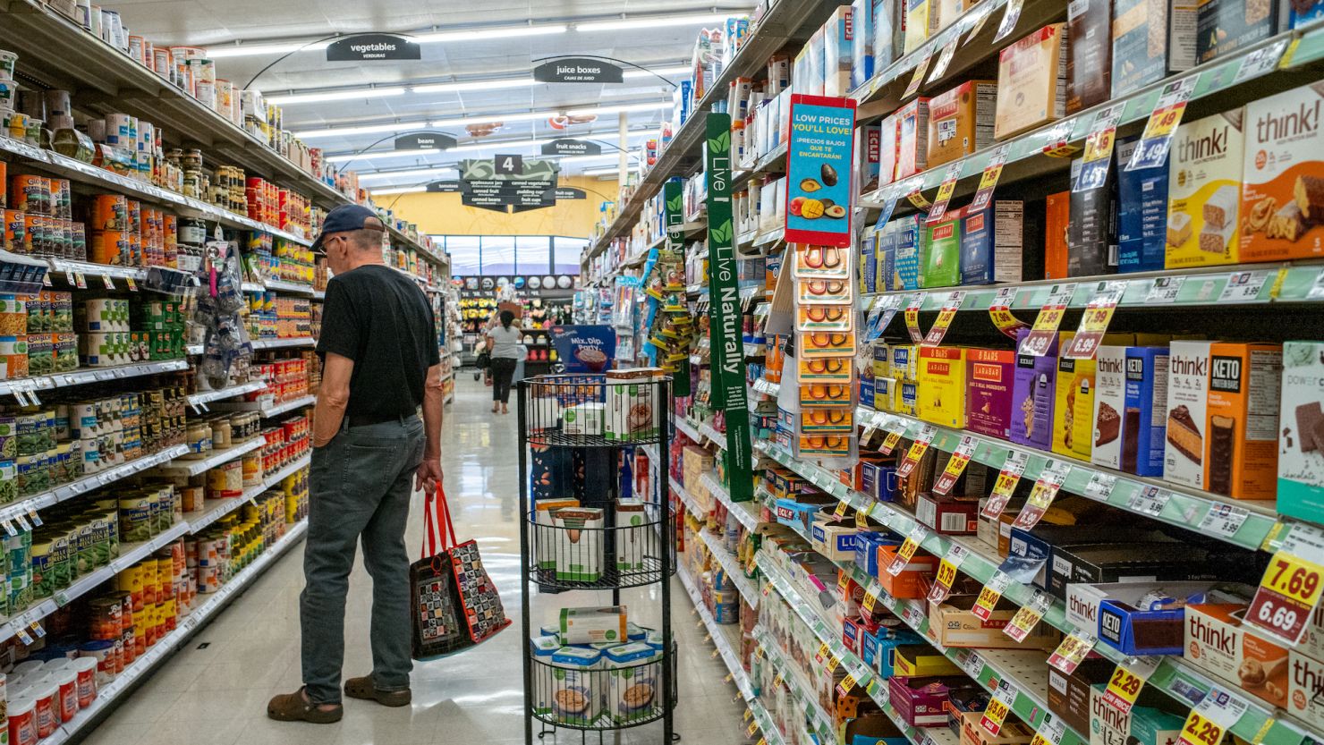 A customer shops in a Kroger grocery store on July 15, 2022, in Houston. 