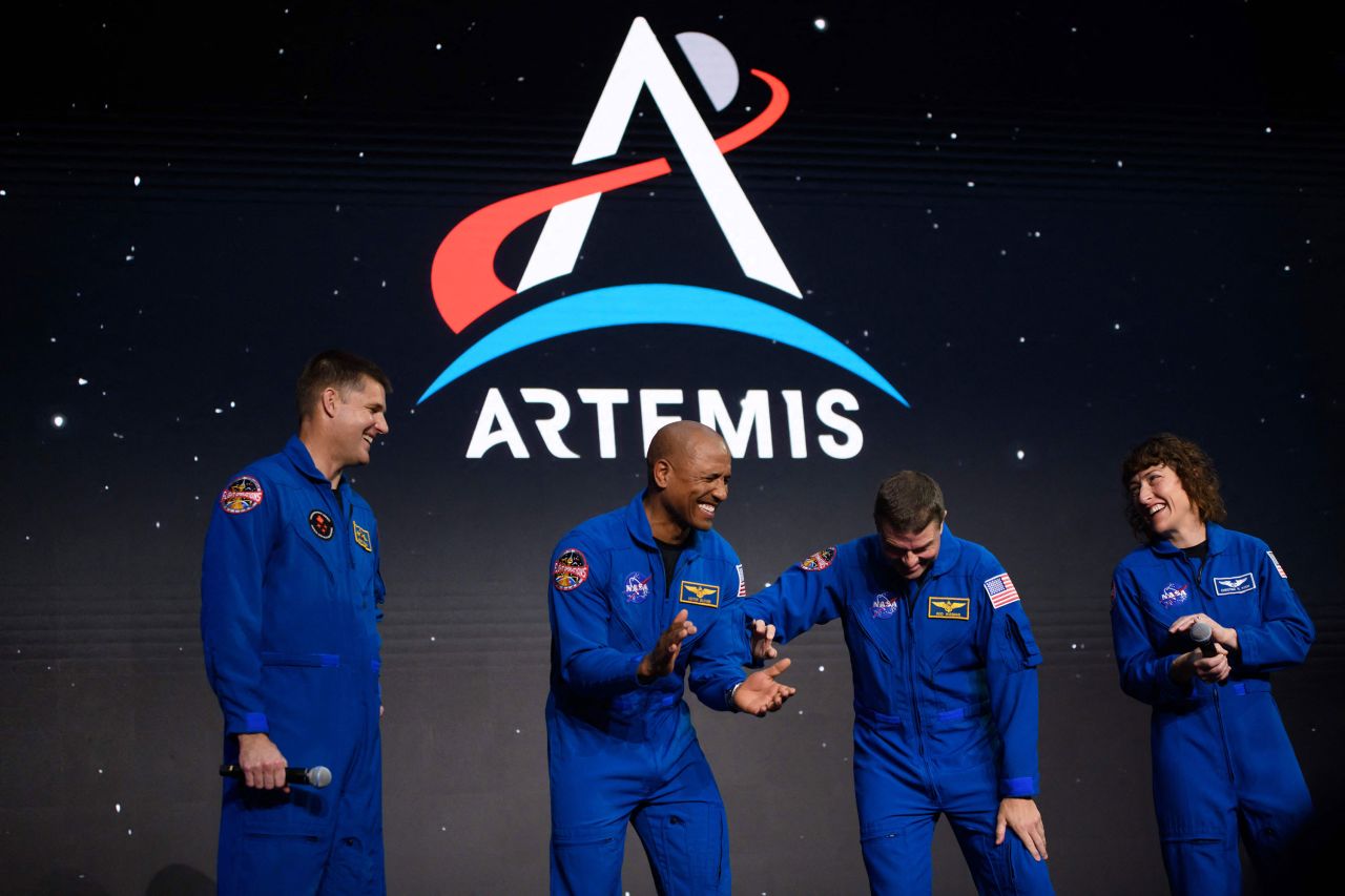 From left, astronauts Jeremy Hansen, Victor Glover, Reid Wiseman and Christina Hammock Koch celebrate on Monday, April 3, after being selected for the upcoming Artemis II mission. The lunar flyby, scheduled for November 2024, will be the first crewed moon mission in five decades.