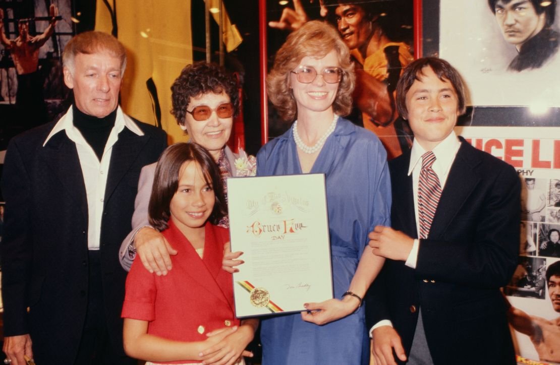 (From left) An unidentified man, Bruce Lee's mother, Linda Cadwell and children Brandon, right, and Shannon celebrate Bruce Lee Day in 1979 in Los Angeles. 