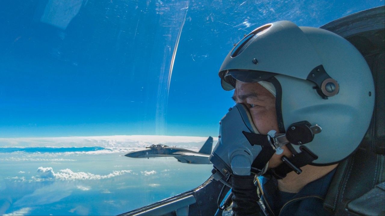 In this photo released by Xinhua News Agency, an air force pilot from the Eastern Theater Command of the Chinese People's Liberation Army (PLA) takes part in exercises around Taiwan on Sunday, Aug. 7, 2022. 