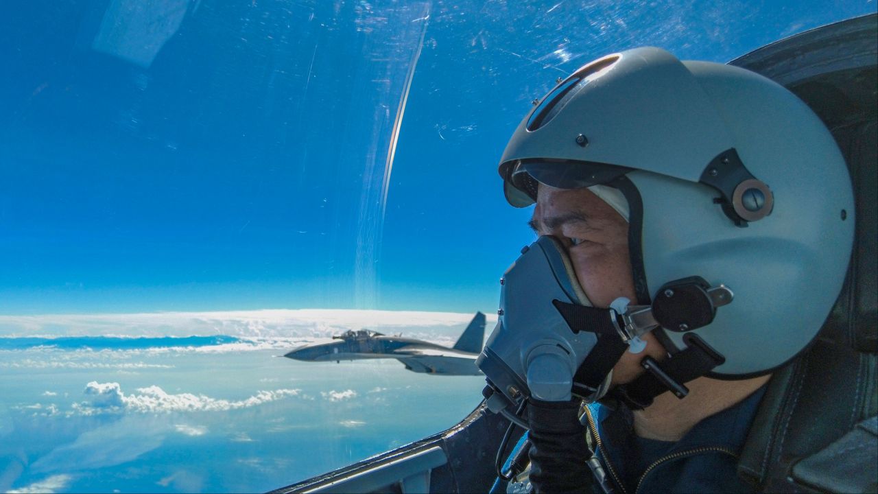 In this photo released by Xinhua News Agency, an Air Force pilot from China's People's Liberation Army (PLA) Eastern Theater Command takes part in exercises around Taiwan, Sunday, Aug. 7, 2022.