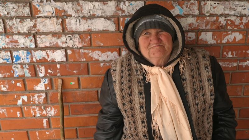 NextImg:Elderly Ukrainians and their pets stay put in the abandoned east | CNN
