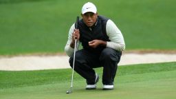 Tiger Woods lines up a putt on the 16th hole during the weather delayed second round of the Masters golf tournament at Augusta National Golf Club on Saturday, April 8, 2023, in Augusta, Ga.