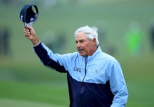 Fred Couples waves to patrons after finishing his second round on Saturday. Couples made history as the <a href="index.php?page=&url=https%3A%2F%2Fwww.cnn.com%2F2023%2F04%2F08%2Fgolf%2Ffred-couples-oldest-player-cut-the-masters-spt-intl%2Findex.html" target="_blank">oldest player to make the cut</a> at the Masters. 