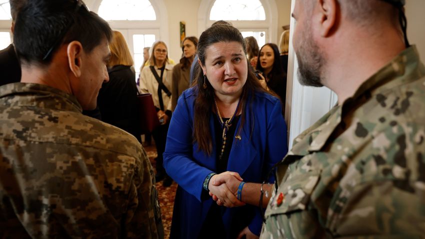 WASHINGTON, DC - FEBRUARY 24: Ukrainian Ambassador to the United States Oksana Markarova (C) greets Ukrainian soldiers during a reception to mark one year since the Russian invasion of Ukraine at Ukraine House on February 24, 2023 in Washington, DC. Injured in the war to defend their country from Russia, the Ukrainian soldiers are in the U.S. to receive prosthetics from the  Protez Foundation in Minneapolis. The Embassy of Ukraine hosted a reception on the anniversary of the start of the war to welcome diplomats, government officials and others and to highlight the country's losses and resilience in the face of a full-scale attack by Russia. (Photo by Chip Somodevilla/Getty Images)