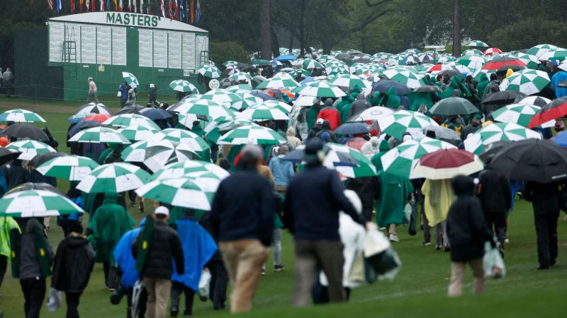 The Masters: Third round suspended as rain drenches field at Augusta National | CNN