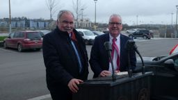 Mark Minihan and Willie Keilthy at the replica podium late US President John F. Kennedy delivered a speech from on a visit to New Ross, County Wexford, Ireland in 1963

Jo Shelley/CNN