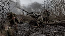 DONETSK OBLAST, UKRAINE - APRIL 3: Ukrainian soldiers of Da Vinci Wolves Battalion firing artillery in the di