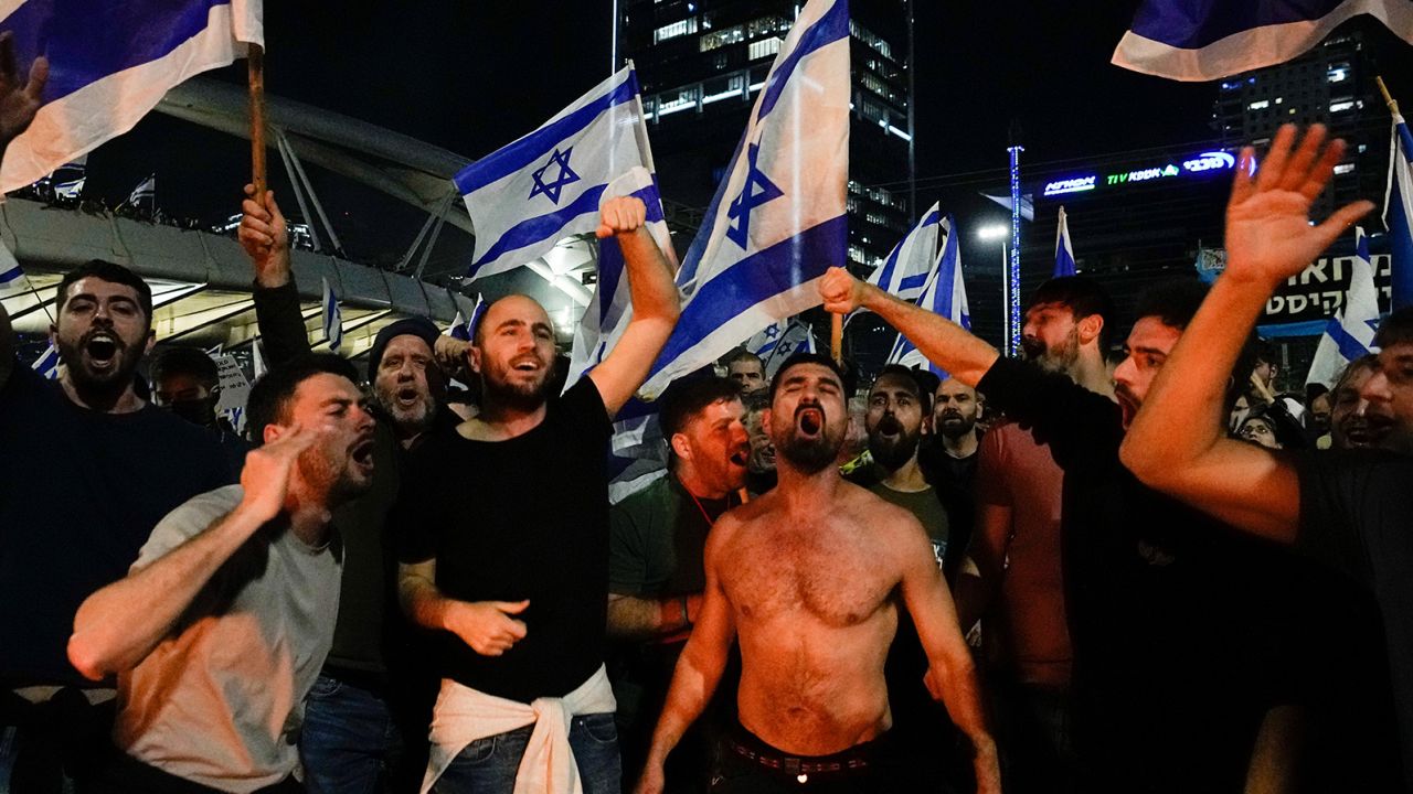 Israelis opposed to Prime Minister Benjamin Netanyahu's judicial overhaul plan demonstrate in Tel Aviv on March 26, 2023. 
