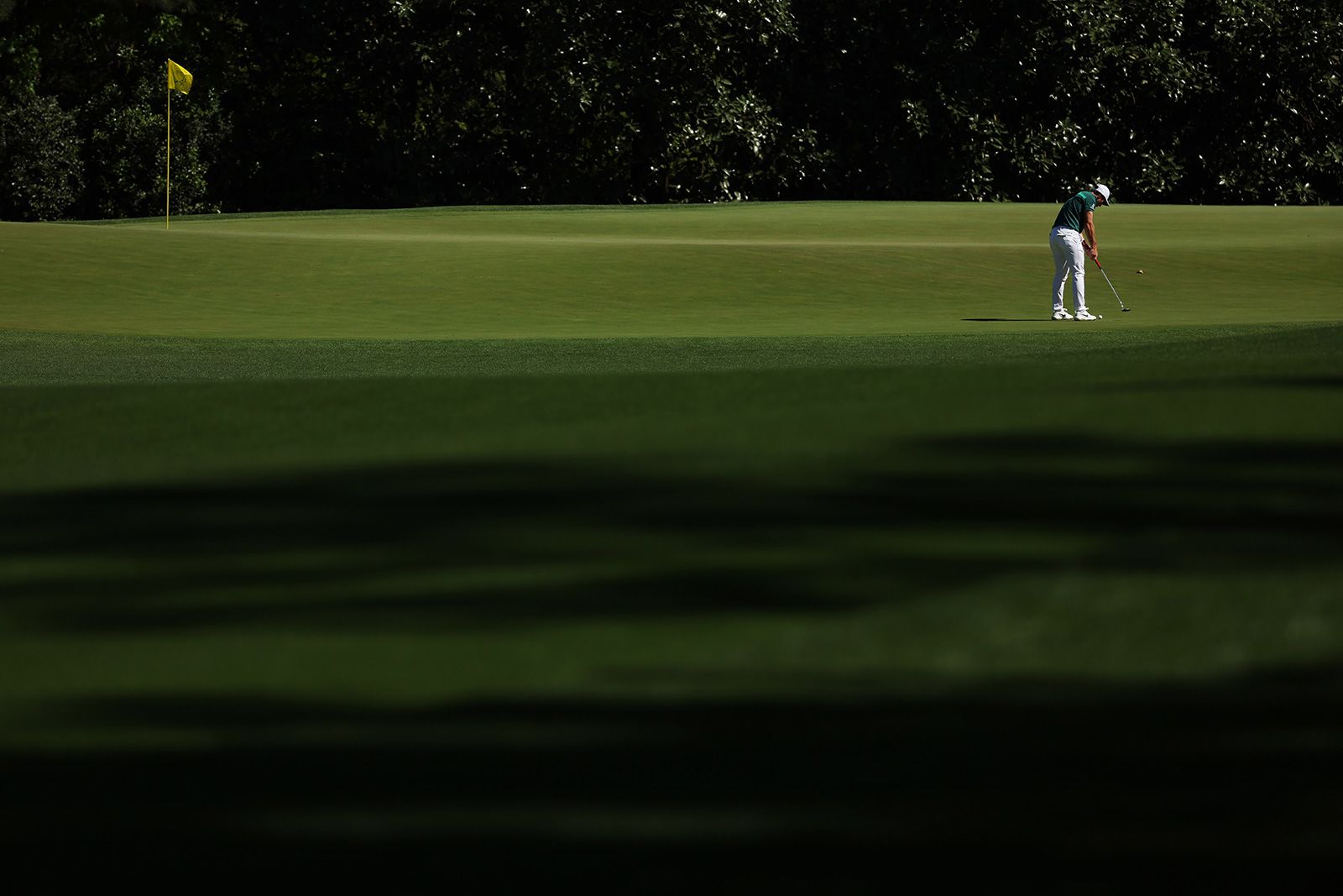 The Masters: Third round suspended as rain drenches field at