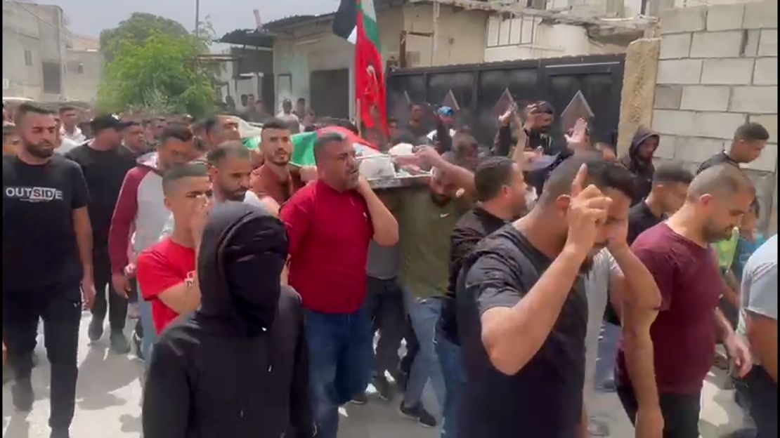 Scores of mourners took to the streets for the funeral of Mohammad Fayez Balhan on Monday. 