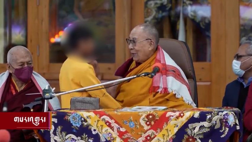 dalai lama young boy blur