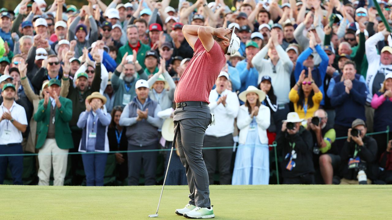 Jon Rahm celebrates on the 18th green after winning the 2023 Masters.