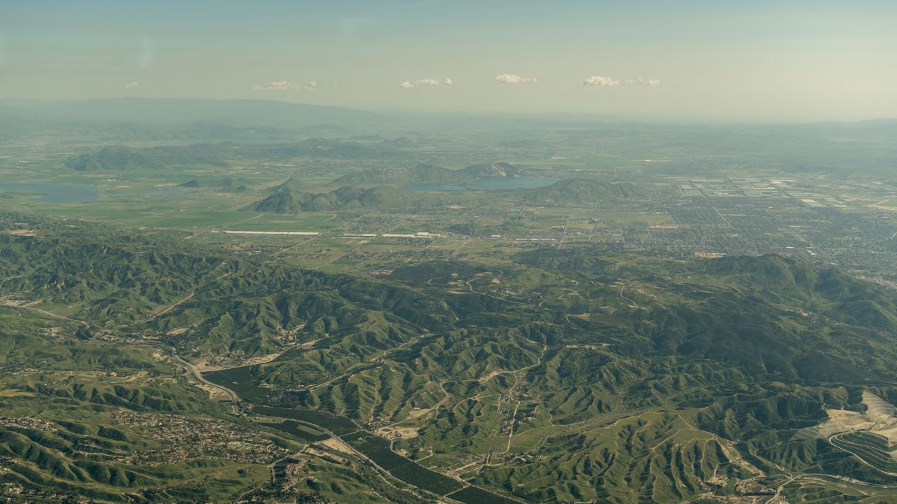 An aerial view of Riverside County, California -- green from recent snow and rain.