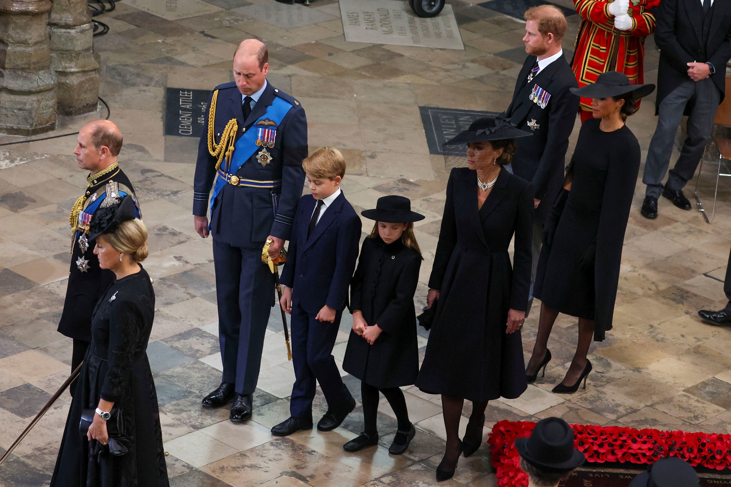 William and Catherine walk with Prince George and Princess Charlotte at the state funeral of Queen Elizabeth II in September 2022.