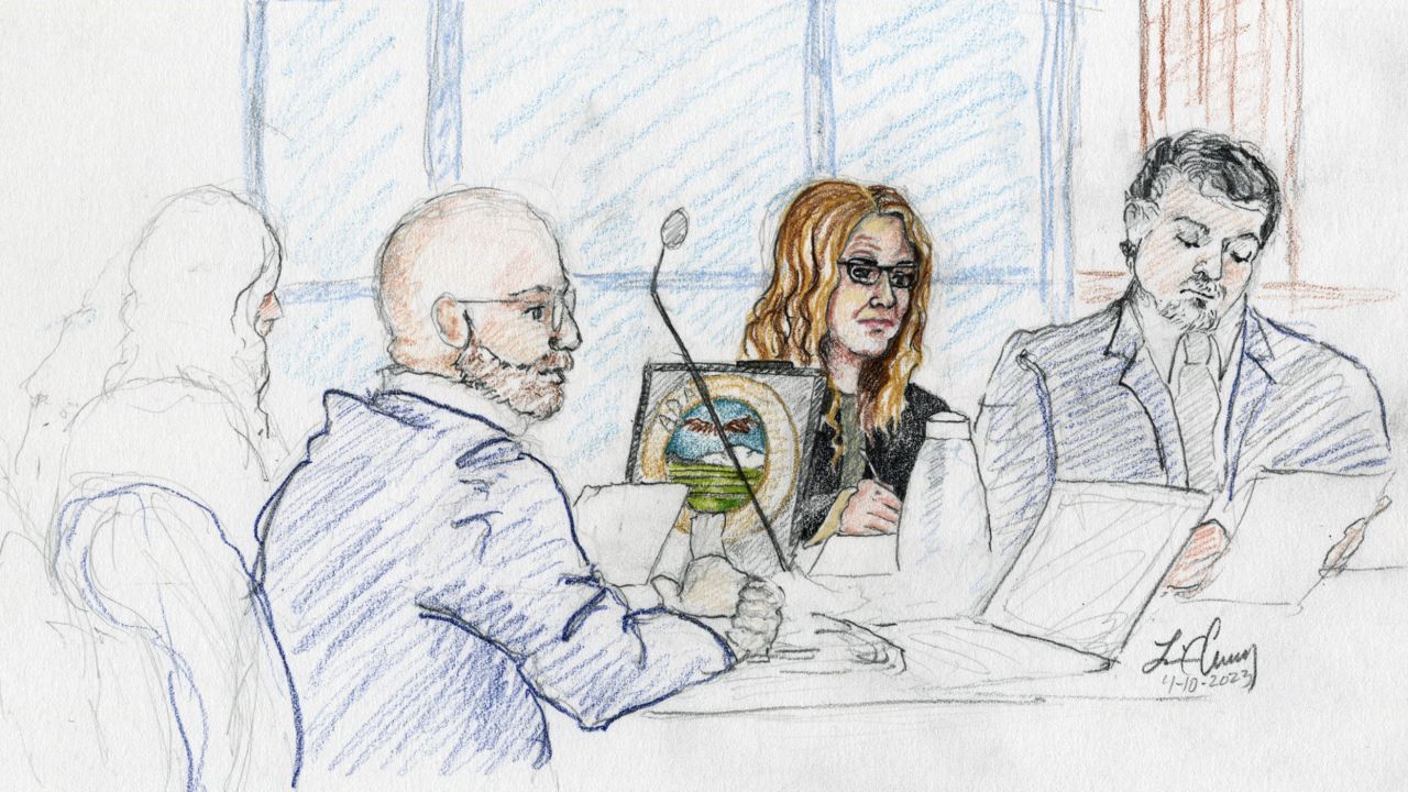 This courtroom sketch, from left, depicts Madison County prosecutor Rob Wood, Lori Vallow Daybell and defense attorney Jim Archibald during opening statements of Vallow Daybell's murder trial in Boise, Idaho, Monday.