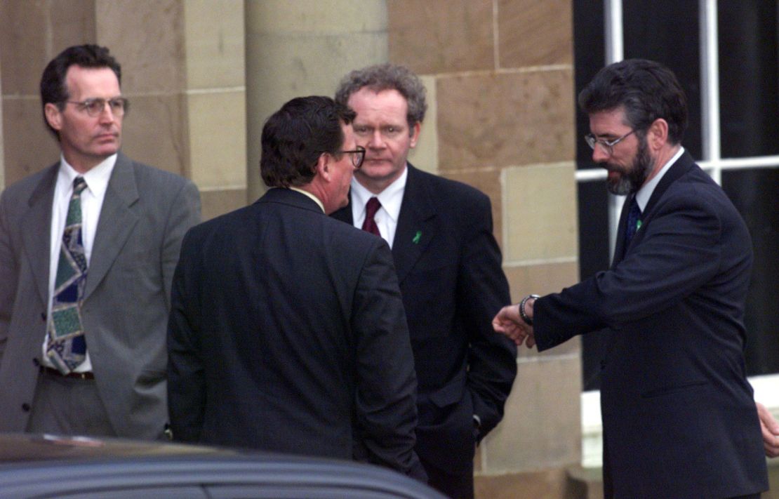 David Trimble of the Ulster Unionist Party (second left) chats with Gerry Adams (right), Martin McGuinness (second right) and Gerry Kelly, of Sinn Fein, during peace negotiations.