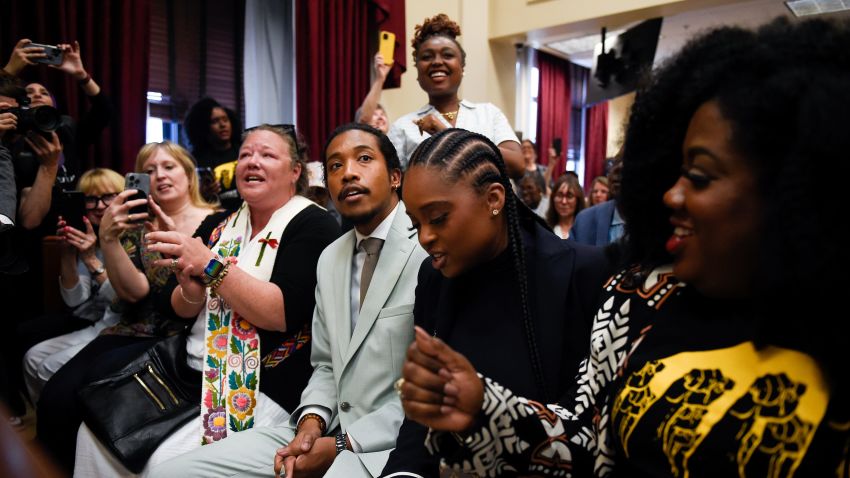 Justin Jones sits with supporters during a Metro Council meeting in Nashville on Monday, April 10, 2023.