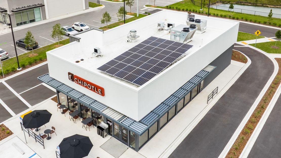 The exterior of a new Chipotle has solar panels.