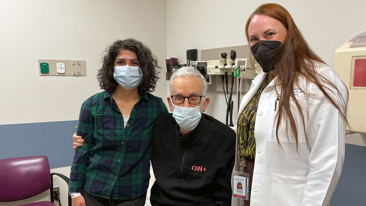 Samira Jafari and Richard Roth with a member of their transplant team, Dr. Danielle Haakinson.