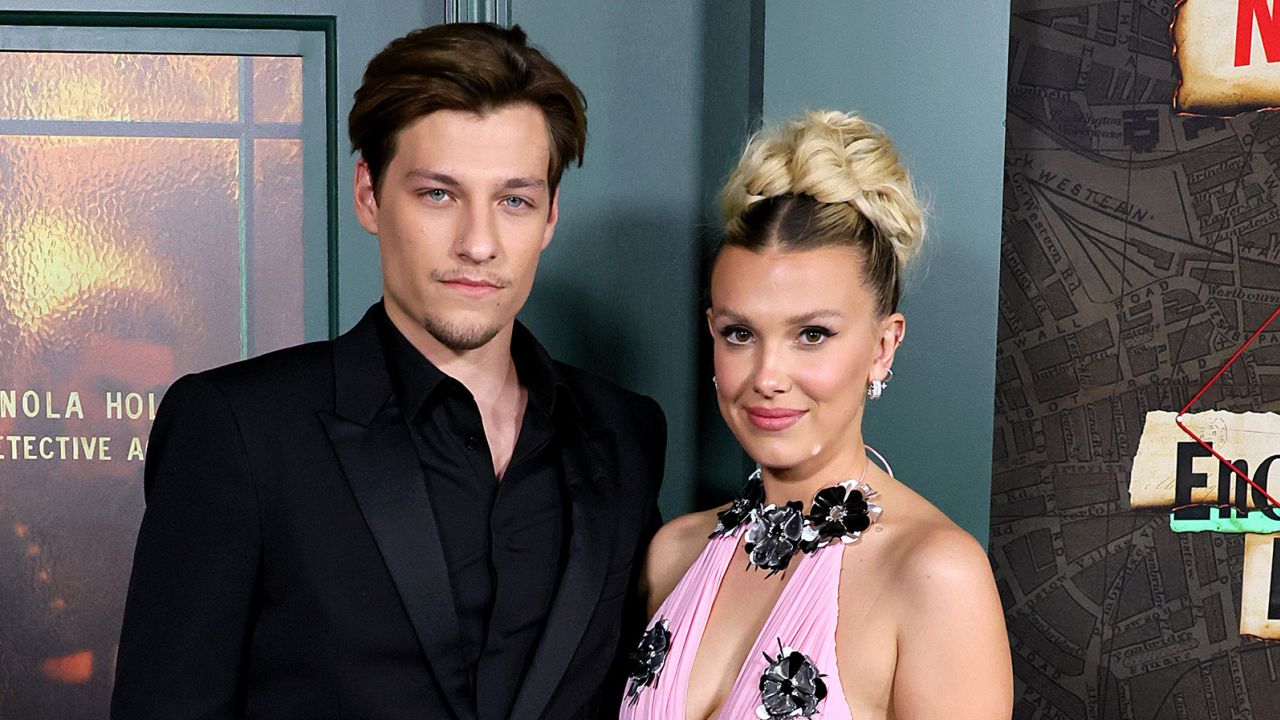 Jake Bongiovi and Millie Bobby Brown, pictured at the "Enola Holmes 2" world premiere in New York last year, have hinted that they're engaged.