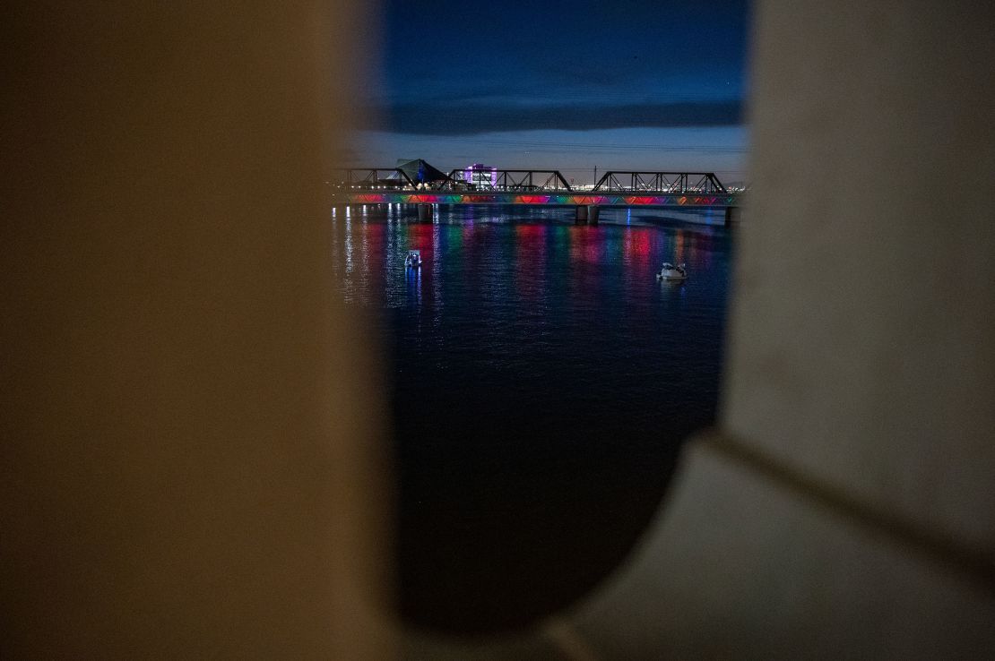 People take swan boats out on the Salt River in Tempe, Arizona on April 6, 2023.