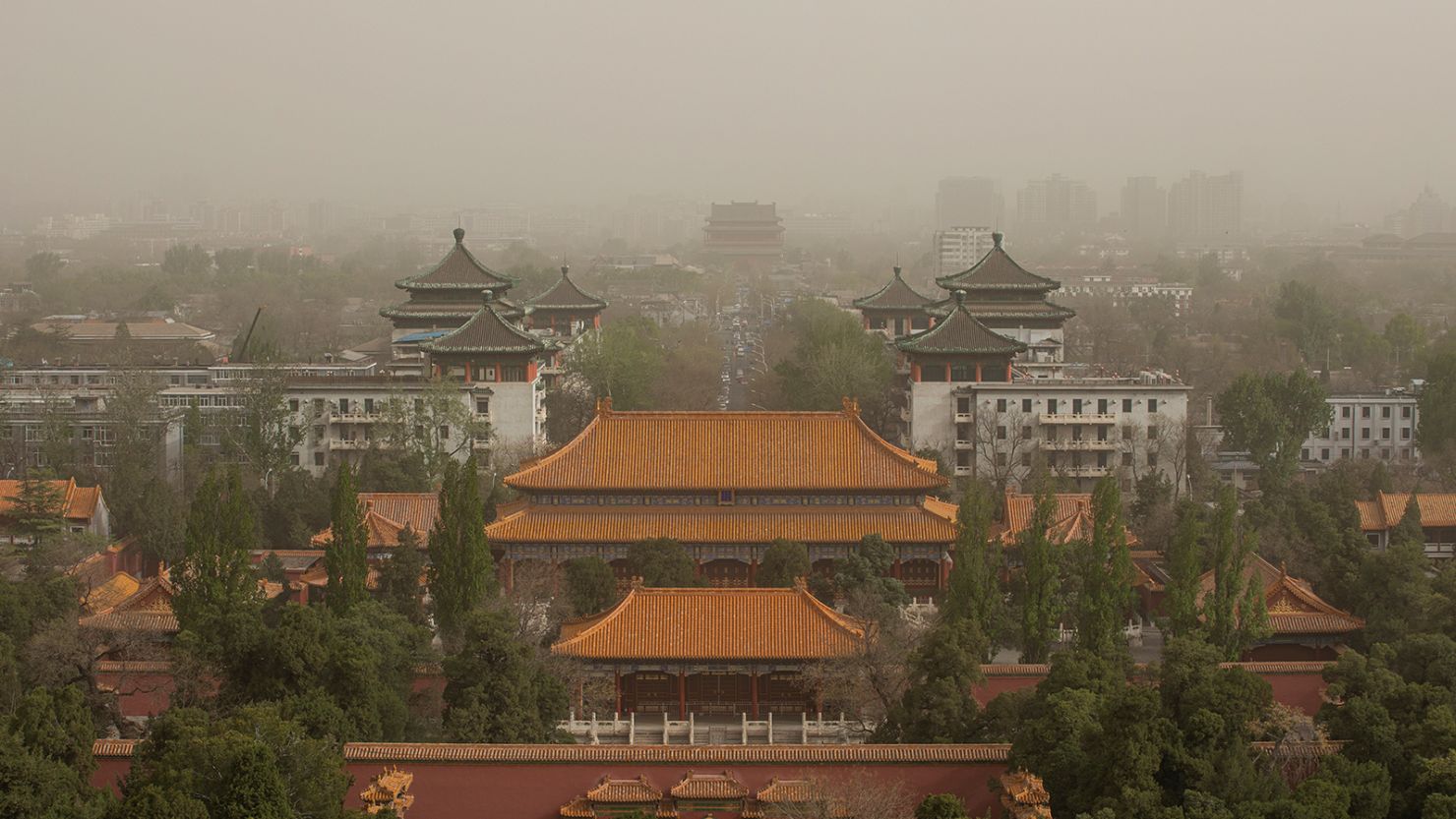 A sandstorm darkens the sky over the Chinese capital Beijing on April 11, 2023.