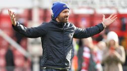 Hollywood actor and co-owner of Wrexham Football Club, Ryan Reynolds, celebrates his team's 3-2 victory during the Vanarama National League fixture between Wrexham and Notts County at The Racecourse Ground on April 10, 2023 in Wrexham, Wales.