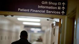 In this January 2014 photo, a sign points visitors toward the financial services department at a hospital, Friday, Jan. 24, 2014.