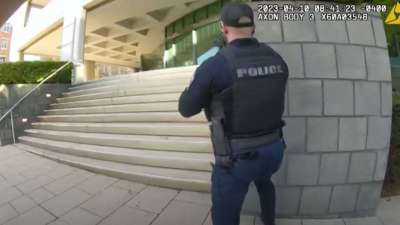 Officer Nickolas Wilt's bodycam shows him and Officer CJ Galloway approaching the bank in downtown Louisville as the gunman fired from the lobby. 