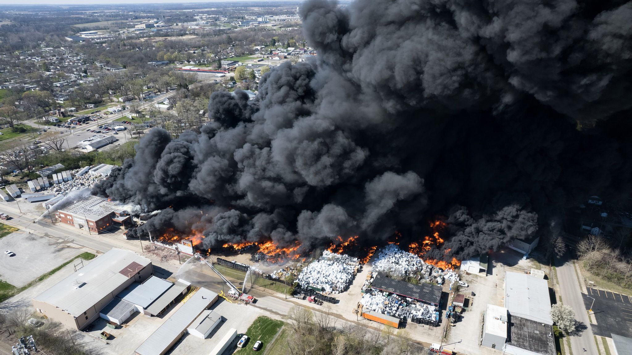 A recycling plant burns in Richmond, Indiana, on Tuesday, April 11. The toxic smoke from the fire forced thousands of people to evacuate. Public schools were also closed. It's not yet clear what sparked the inferno.