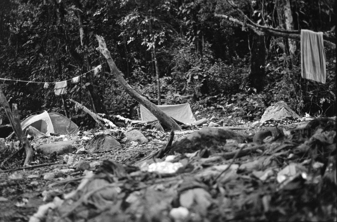 The old route, near Tres Bocas, is covered in garbage, camping tents and clothing abandoned by migrants.