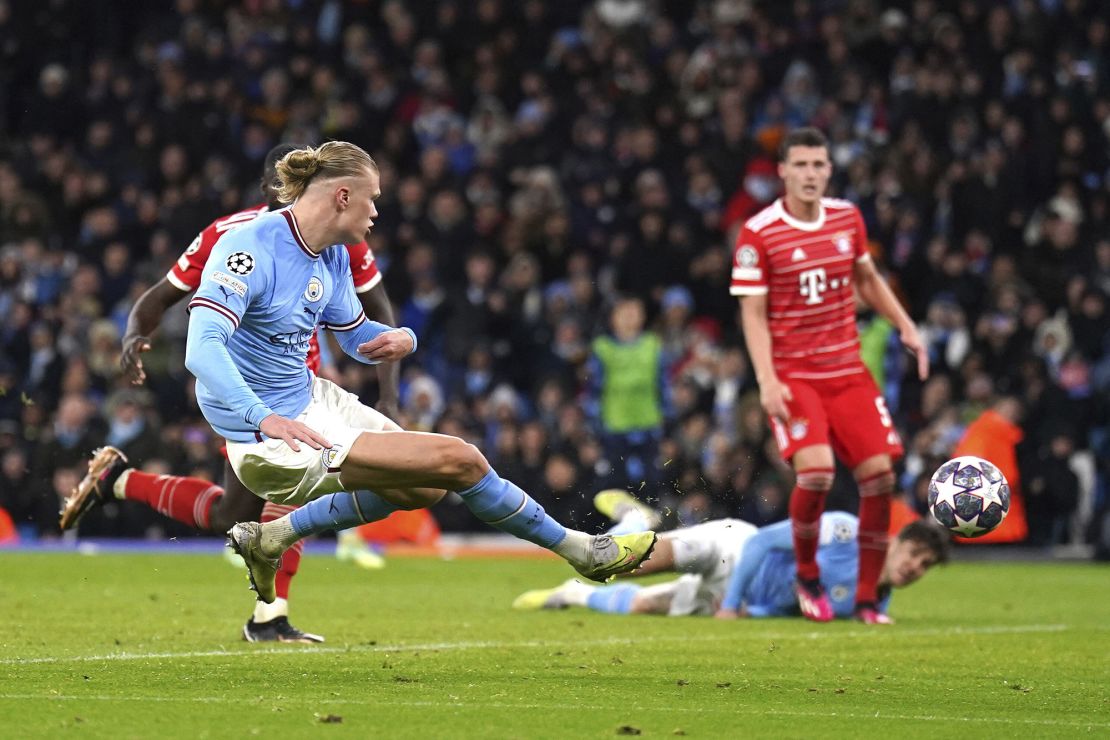 Haaland scores his side's third goal during the Champions League quarterfinal first-leg.