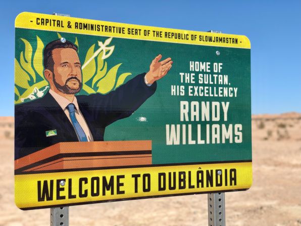 <strong>The nation's capital: </strong>A sign welcome's visitors to Dublândia, the capital of Slowjamastan, where Williams has his open-air government office.