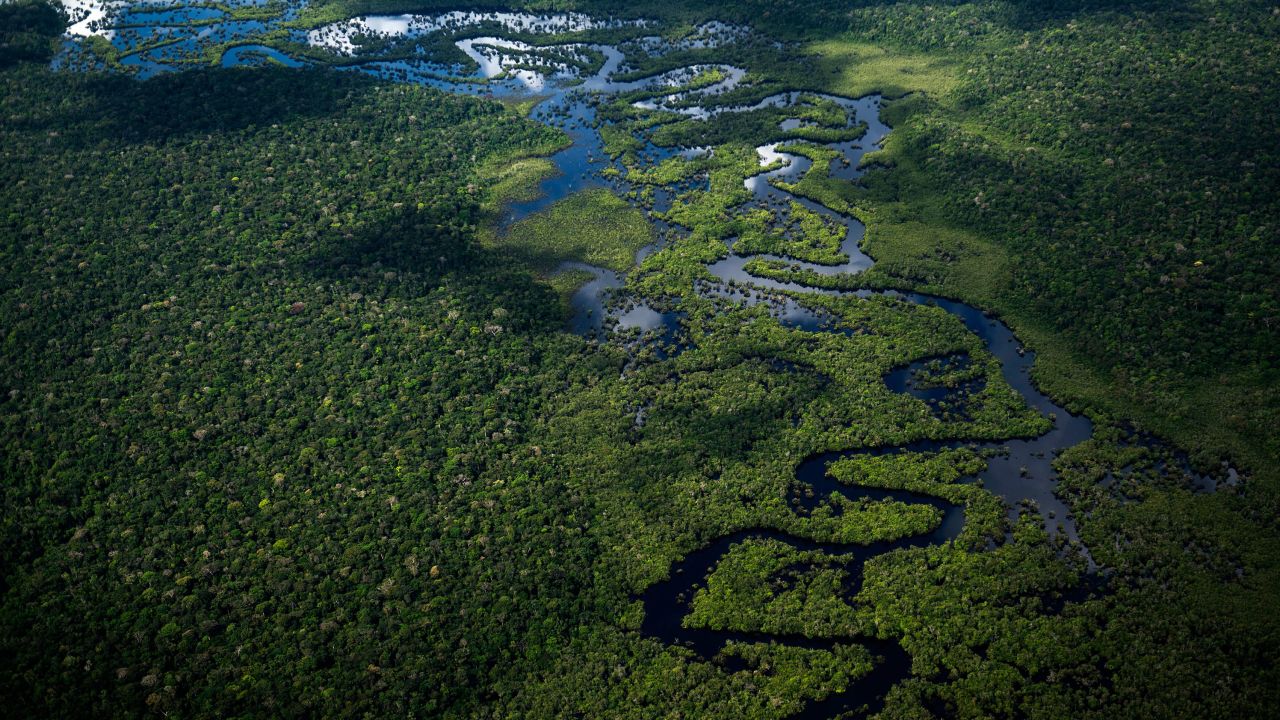 Aerial view of the Amazon rainforest taken from a plane flying from the city of Manicore to Manaus, Amazonas State, Brazil, on June 10, 2022.