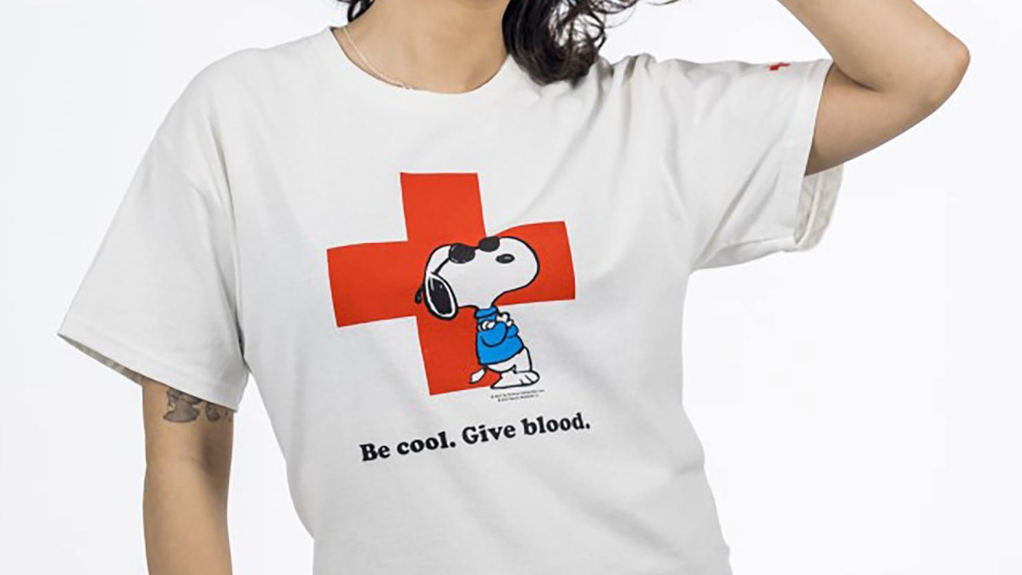This Red Cross Snoopy shirt has gone viral in recent days, igniting an uptick in blood donations.