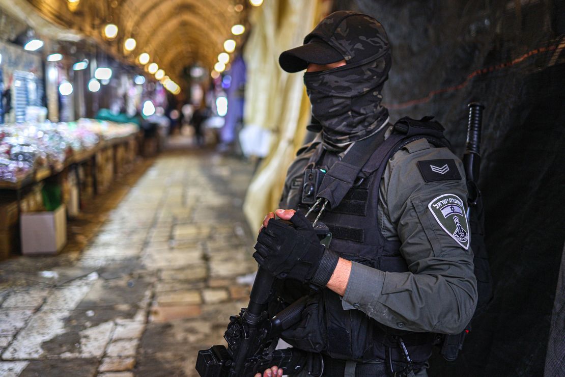 An Israeli police officer stands guard at the Qattaneen market in the Old City of Jerusalem. There was a heightened security presence at the holy site when Easter, Ramadan, and Passover celebrations overlapped.