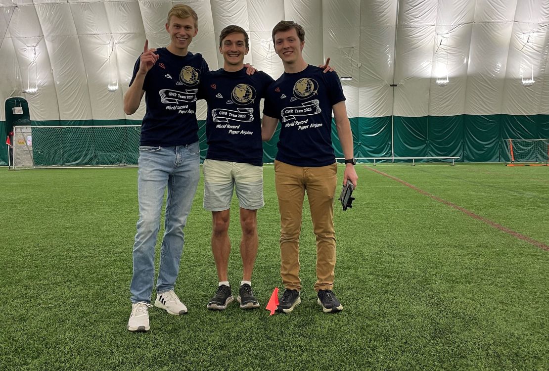 Nathan Erickson (from left), Dillon Ruble and Garrett Jensen are aerospace engineers turned world record holders with their paper plane design inspired from hypersonic vehicles.