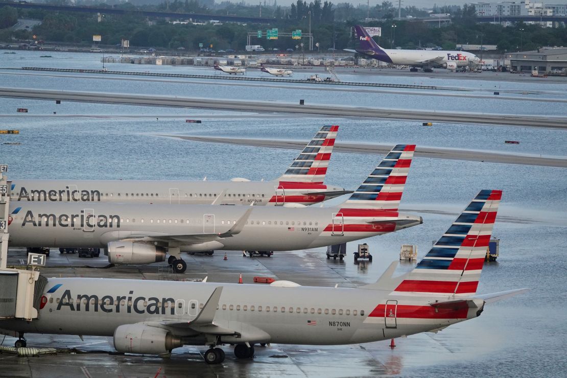 Airplanes sit at Fort Lauderdale-Hollywood International Airport Thursday after heavy rain caused the airport to shut down.