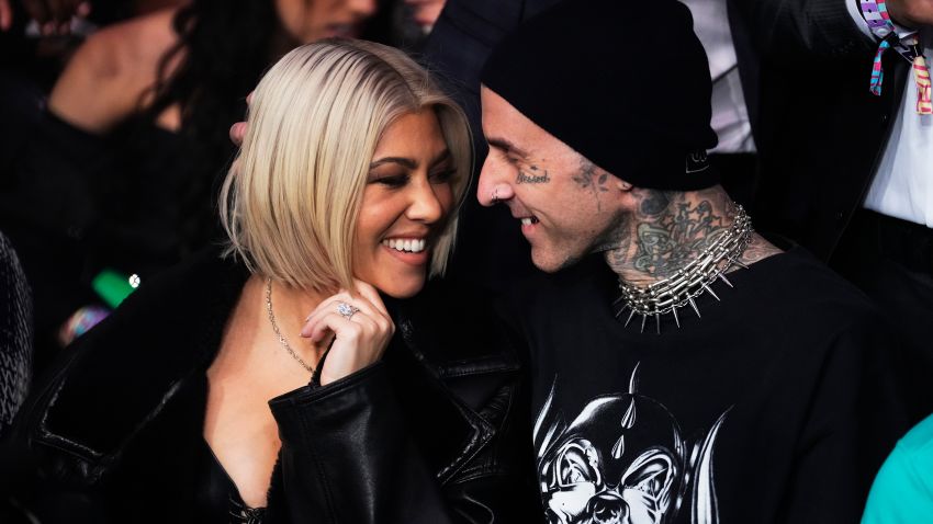 Kourtney Kardashian and Travis Barker attend the UFC 285 event at T-Mobile Arena on March 04, 2023 in Las Vegas, Nevada.