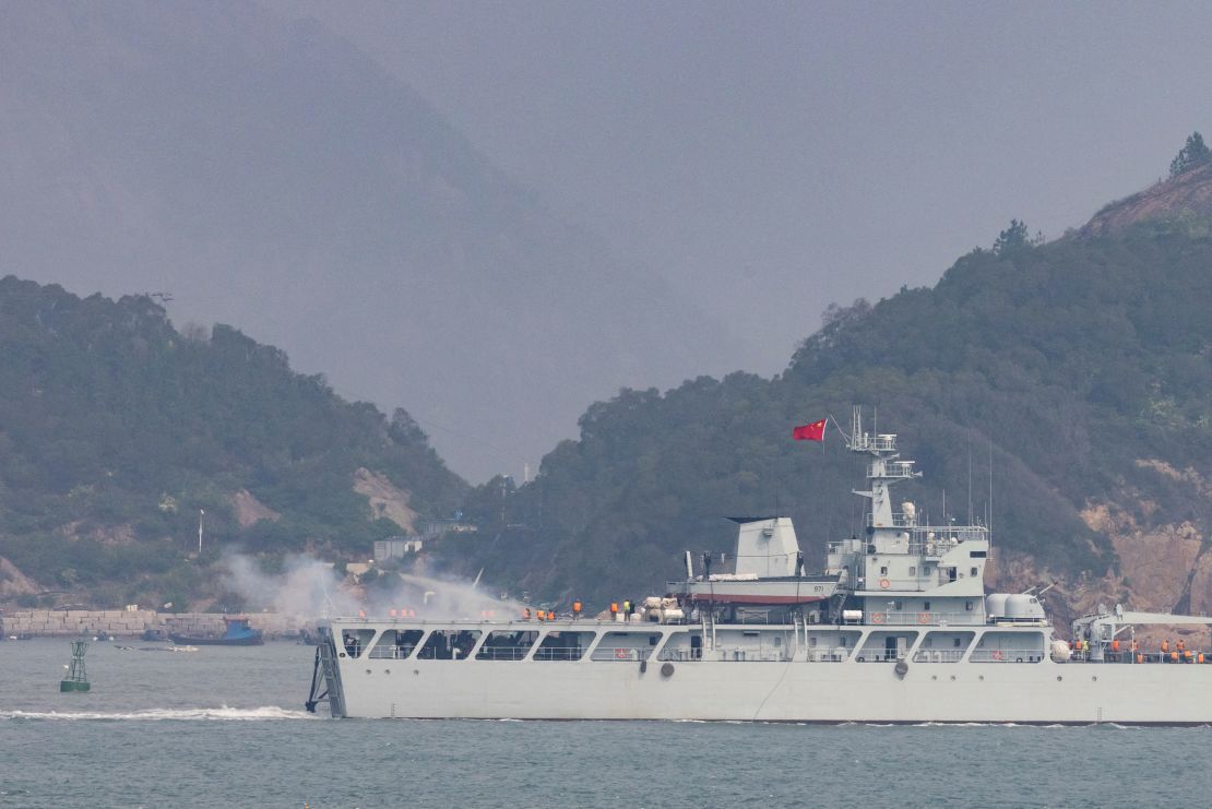 A Chinese warship fires towards the shore during a military drill near Fuzhou near the Taiwan controlled Matsu Islands that are close to the Chinese coast, China, April 8, 2023.  