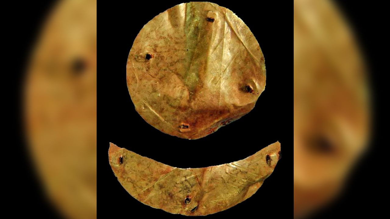 Golden icons of the sun and moon, symbols of the Xiongnu, decorate a coffin found in Elite Tomb 64 at the Takhiltyn Khotgor site.