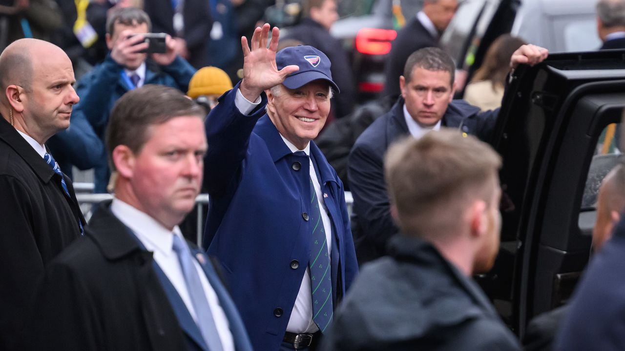 President Joe Biden waves to members of the public who have gathered for his arrival on April 12, 2023 in Dundalk, Ireland.