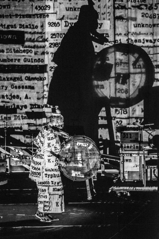 An international ensemble of actors, singers, dancers, and musicians perform onstage, complementing Kentridge's visuals projected onto the 10-yard-high backdrop.