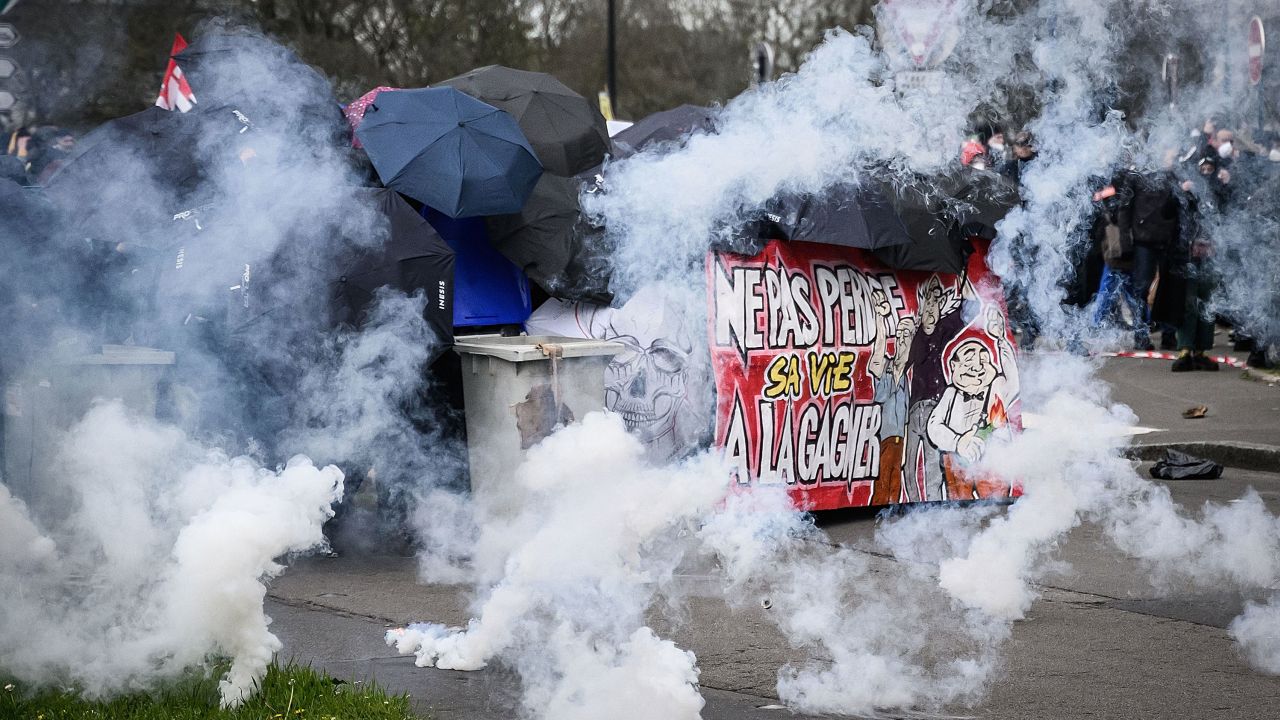 Protesters clash with police officers in Nantes, western France on April 13, 2023. 