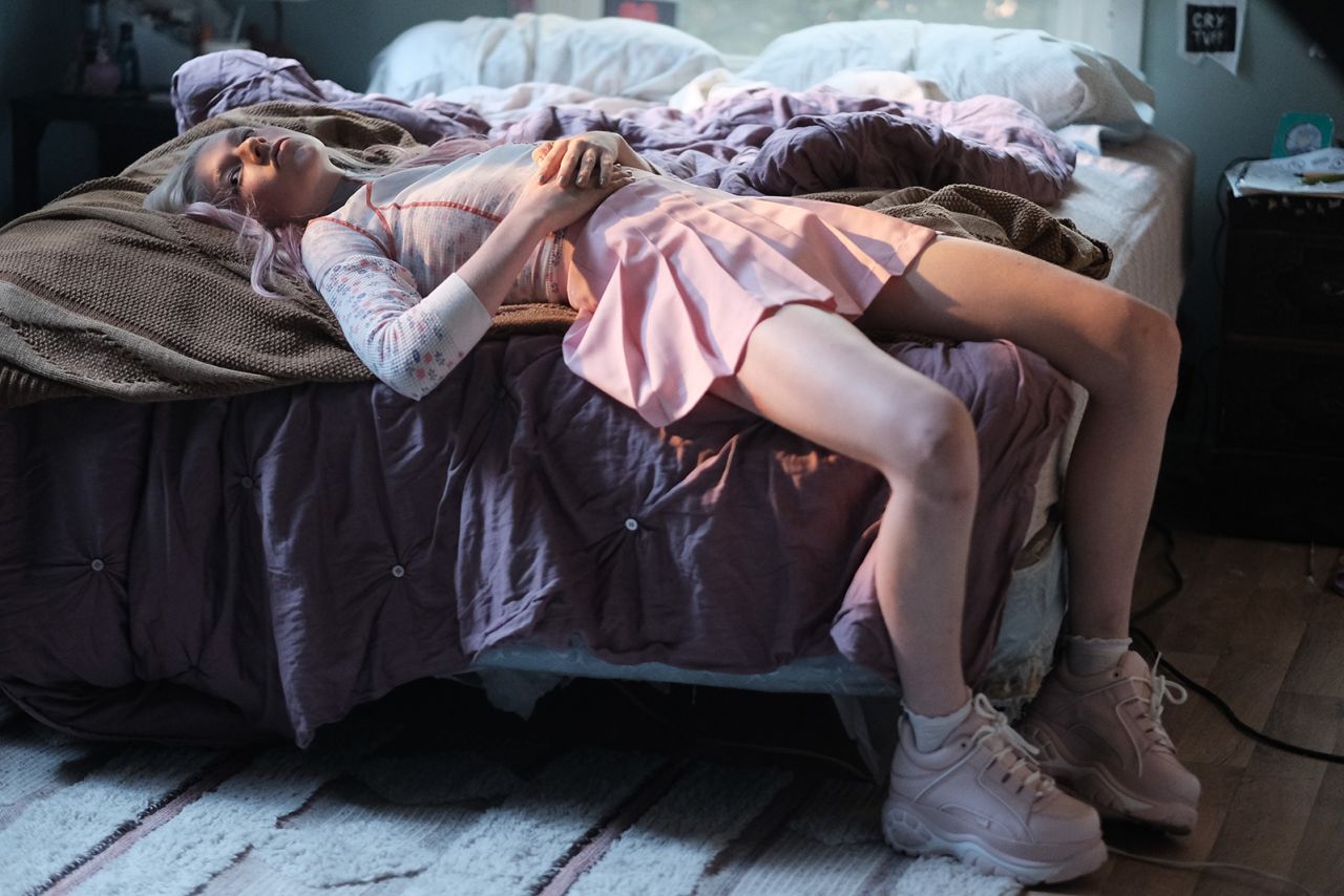Sourced from a vintage clothing dealer in Los Angeles, the floral sweater worn here