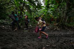 Venezuelan migrants arrive at Canaan Membrillo village, the first border control of the Darien Province in Panama, on October 13, 2022. 