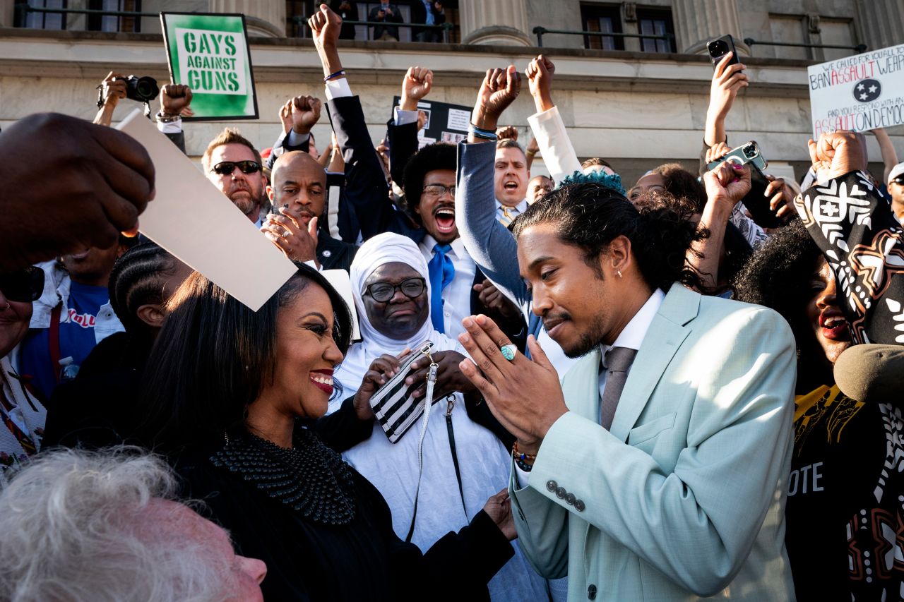 Tennessee state Rep. Justin Jones thanks Chancellor I'Ashea L. Myles after taking the oath of office on the steps of the House chamber in Nashville on Monday, April 10. He was reinstated after being expelled from the House last week.