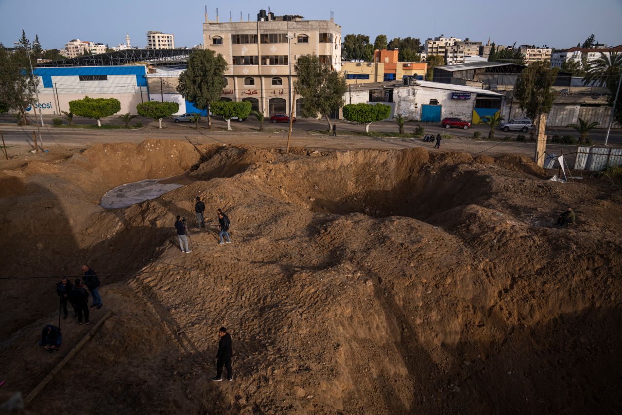 People in Gaza City inspect damage from overnight Israeli airstrikes on Friday, April 7. The strikes came hours after dozens of rockets were fired from Gaza and Lebanon into Israeli territory, an attack the Israeli military blamed on Palestinian militants. Israel struck militant targets in southern Lebanon and Gaza, concluding three days of rising tensions in the region following police raids on the al-Aqsa mosque in Jerusalem. 